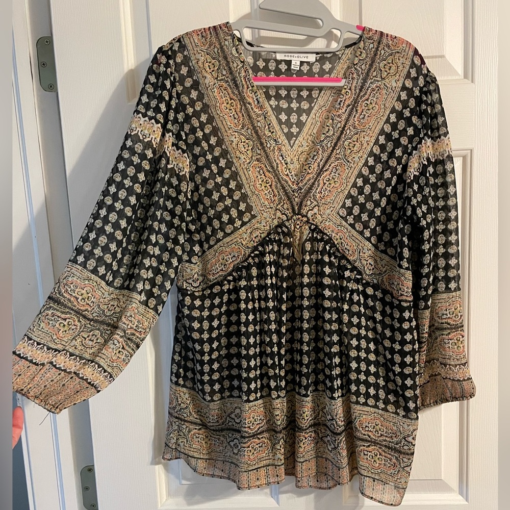 Lightweight sheer blouse. I’m a size 6 and 5’4”.